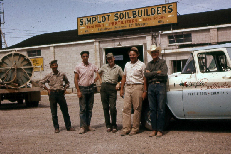 Simplot Crop Advisors in front of their location and fleet truck